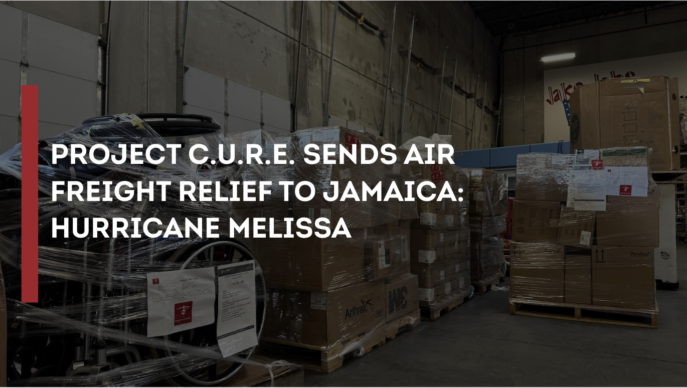 Photo in Project C.U.R.E.'s Denver, Colorado Warehouse of Medical Supplies going to Jamaica for Hurricane Melissa Emergency Relief. Text over image that says "Project C.U.R.E. Sends Air Freight of Emergency Relief Equipment to Jamaica: Hurricane Melissa."